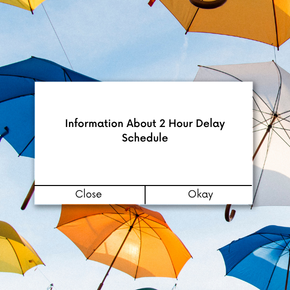 A notification about a 2-hour delay schedule over colorful umbrellas in the sky.